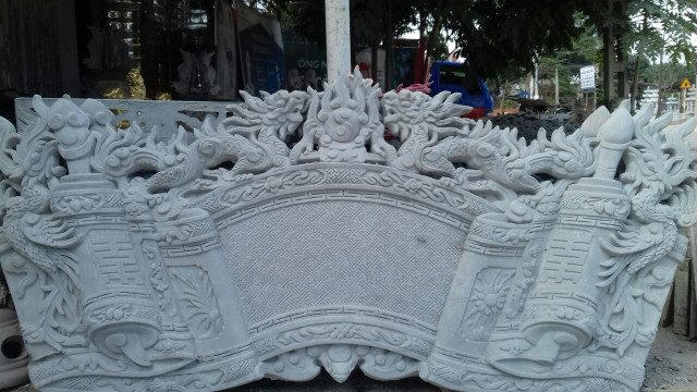 Hoa văn phù điêu cuốn thư xi măng