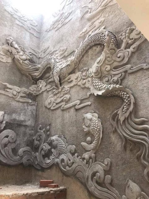 tranh phù điêu đắp nổi bằng xi măng giả đồng