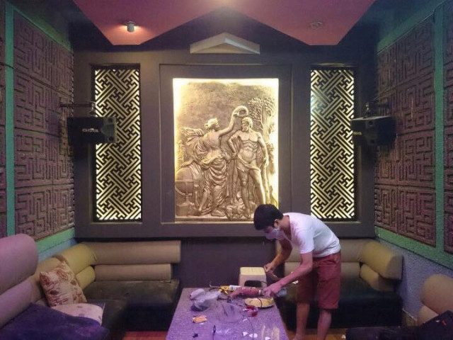 tranh phù điêu đắp nổi bằng xi măng giả đồng