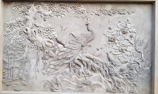 tranh phù điêu đắp nổi bằng xi măng giả đồng